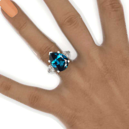 5.5 Pear Cut Tri-Stone Cornflower Sapphire White Gold Engagement Ring