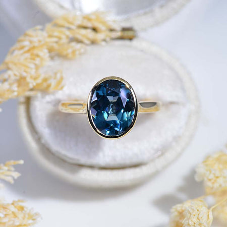 3 Carat Oval Teal Sapphire Bezel Set Yellow Gold Engagement Ring