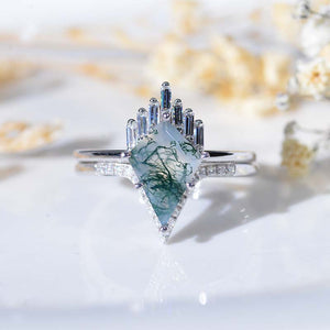 https://www.giliarto.com/products/14k-white-gold-4-carat-kite-moss-agate-halo-engagement-ring-eternity-ring-set