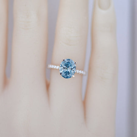 2 Carat Oval Lab-Grown Fancy Vivid Blue Diamond Hidden Halo Rose Gold Engagement Ring