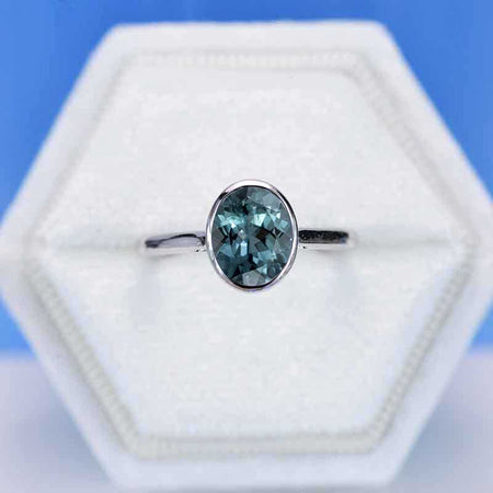 3 Carat Oval Teal Sapphire Bezel Set Engagement Ring