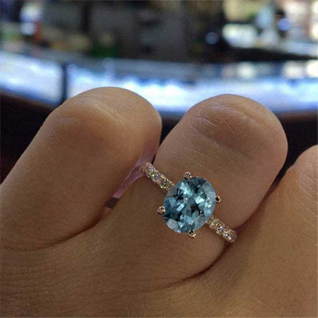 3 Carat Teal Sapphire Oval Cut Hidden Halo Rose Gold Engagement Ring