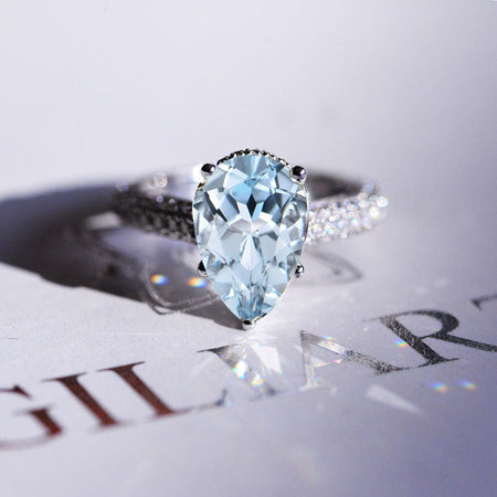 4 Carat Pear Cut Aquamarine Hidden Halo Gold Engagement Ring