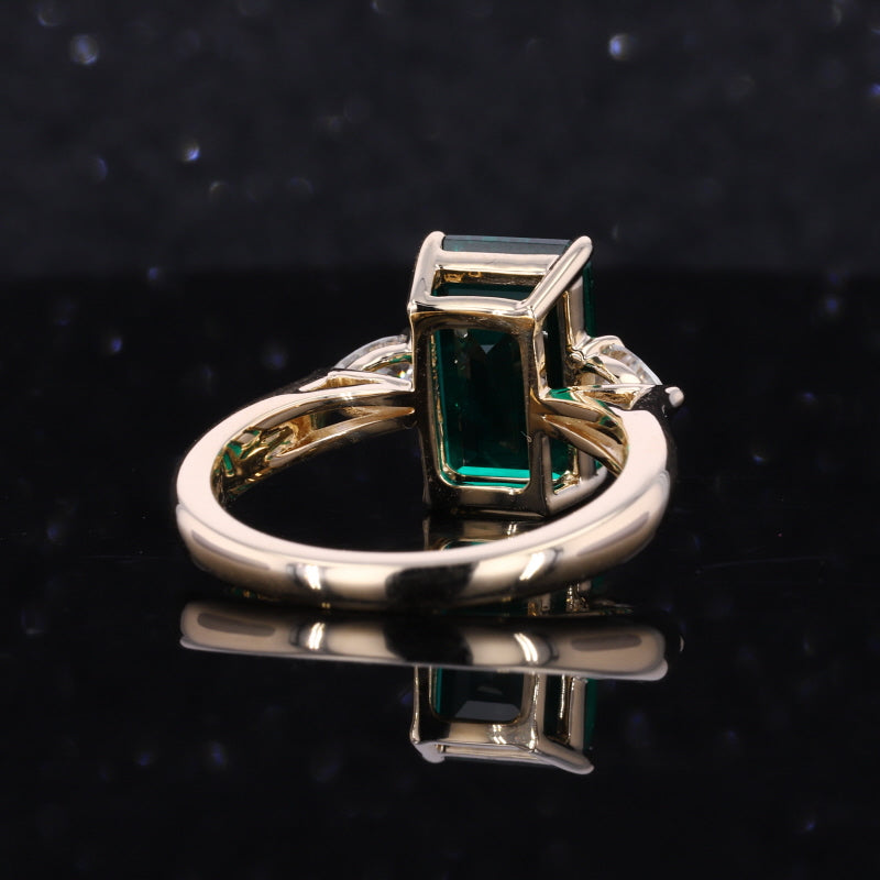 Elongated emerald online cut diamond ring