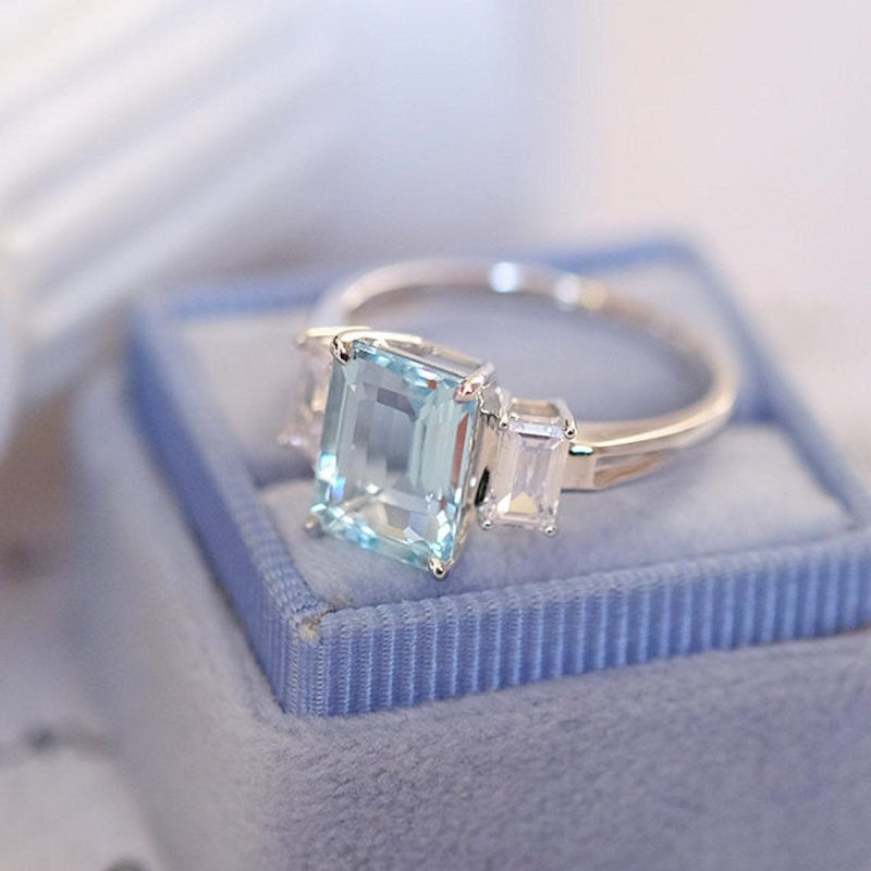 Three Stone Emerald-Cut Aquamarine and Diamond Ring | Angara